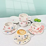porcelain coffee cups and saucers